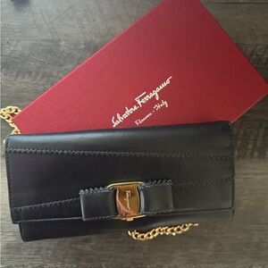 Salvatore Ferragamo Black Clutch with Sleek Design